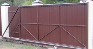 Купить откатные ворота из профнастила Малоярославец, цена от 1802 руб.