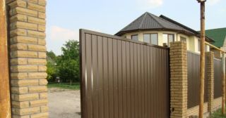 Купить откатные ворота из профнастила Малоярославец, цена от 1802 руб.